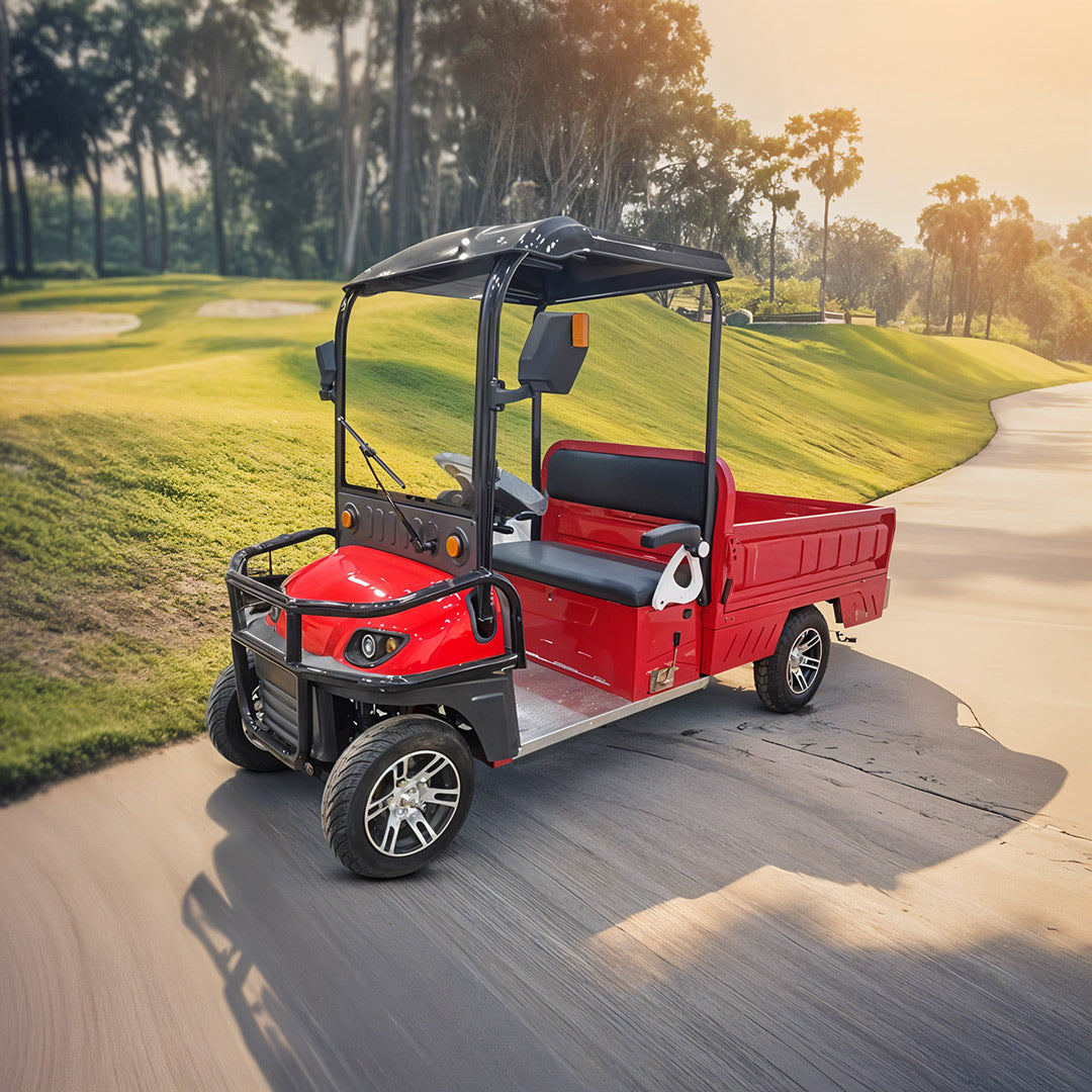 Red golf cart on a golf course path with trees in the background