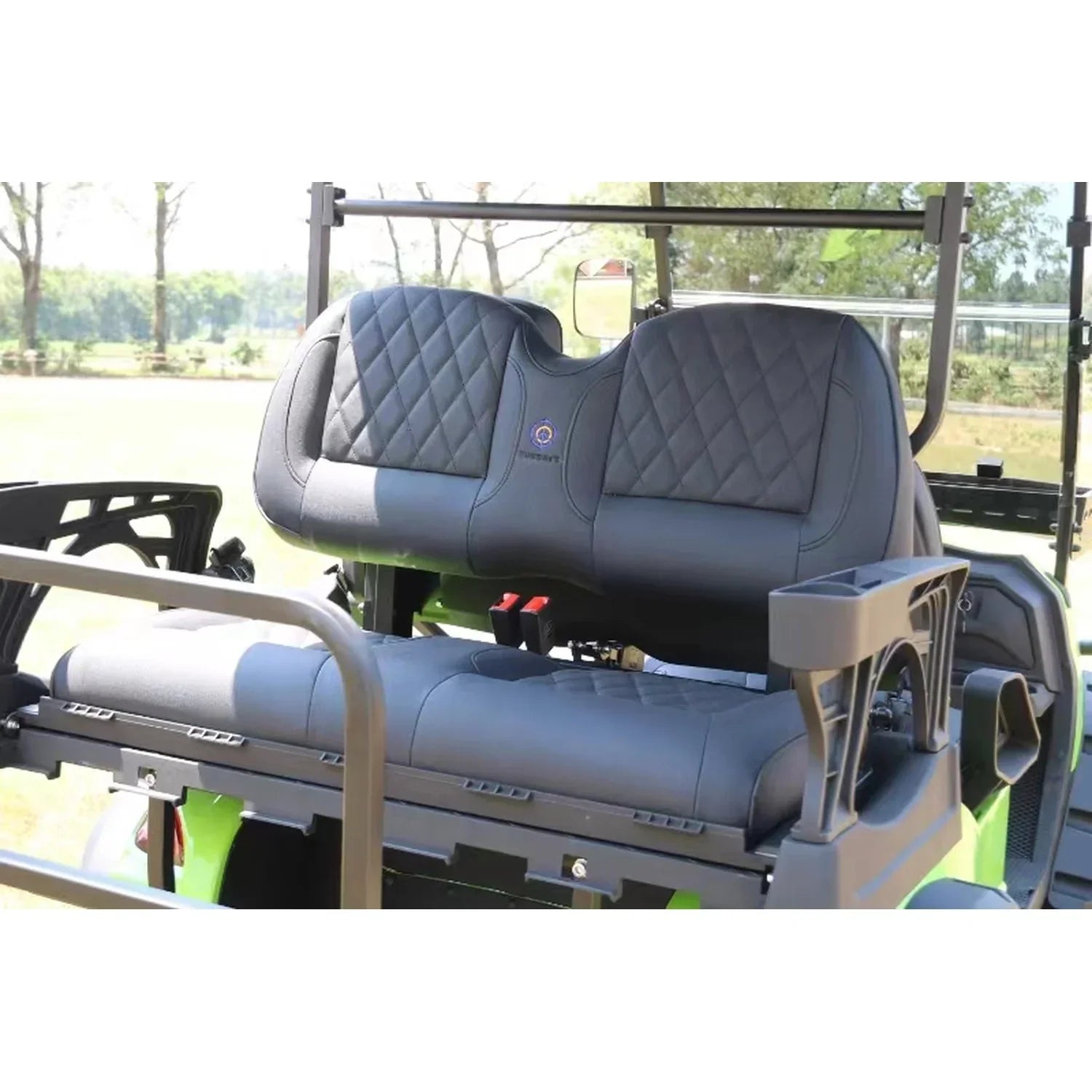 Gray seat with quilted design on a vehicle, outdoors