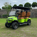 Green golf cart with brown seats on a grassy area