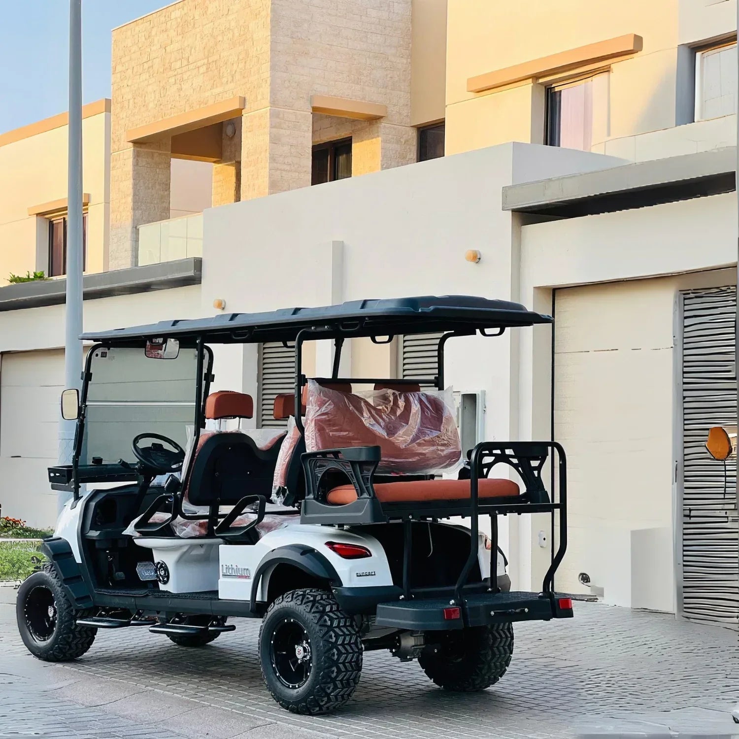 Golf cart parked in front of a building